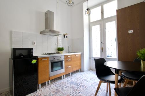 Kuchyň nebo kuchyňský kout v ubytování Standard Apartment by Hi5 - Steindl street