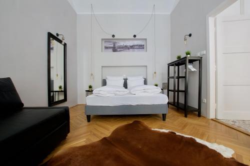 מיטה או מיטות בחדר ב-Standard Apartment by Hi5 - Steindl street