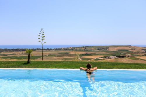 Bazén v ubytování Torre Bonera. Green Resort nebo v jeho okolí