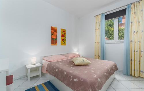 Postel nebo postele na pokoji v ubytování Apartments Baldini
