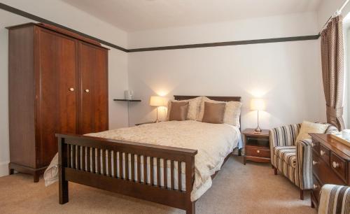 Postel nebo postele na pokoji v ubytování Natal House Bed & Breakfast
