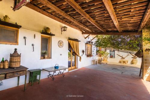 Agriturismo Val Di Notoにあるバルコニーまたはテラス