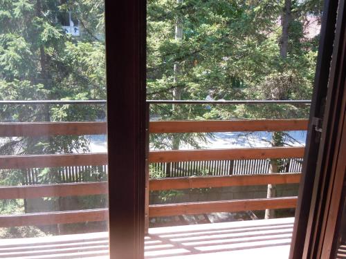a view from a window of a porch at Apartmani Sobe BILJANA in Arandjelovac