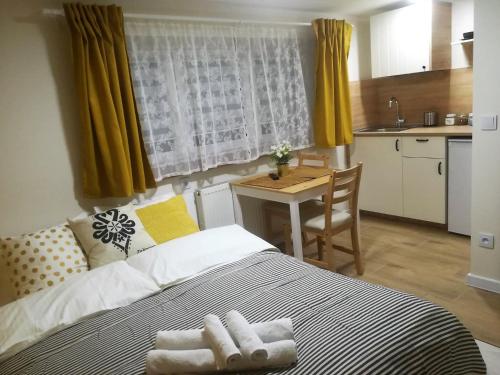 Kuchyň nebo kuchyňský kout v ubytování Apartamenty Milka