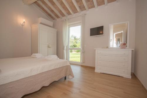 Posteľ alebo postele v izbe v ubytovaní Agriturismo Il Mirto