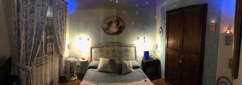 Voodi või voodid majutusasutuse Holiday Home La Casetta delle Candele toas