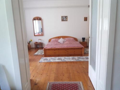 Кровать или кровати в номере Hársfák
