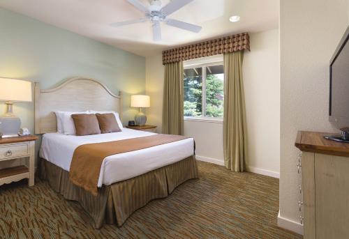 a bedroom with a large bed and a window at WorldMark South Shore in Zephyr Cove
