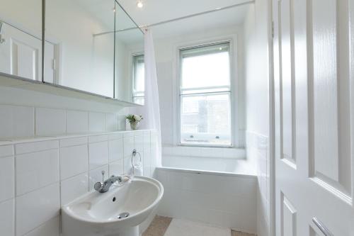 Ένα μπάνιο στο COVENT GARDEN PIAZZA RESIDENCE