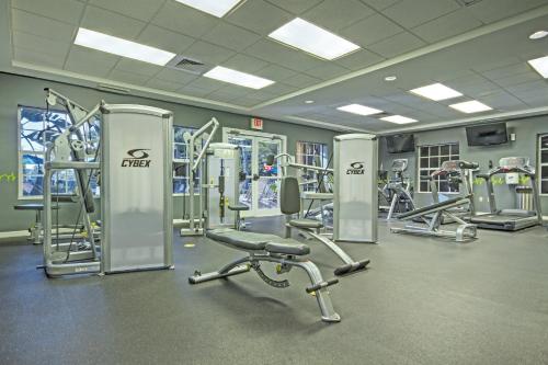 a gym with a bunch of treadmills and machines at Club Wyndham Cypress Palms in Kissimmee