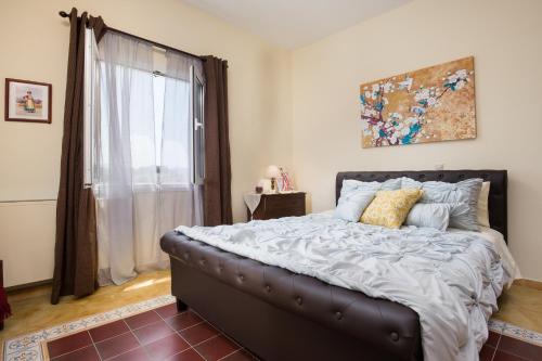 Кровать или кровати в номере The Four Seasons House City Villa with Pool