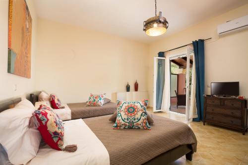 Кровать или кровати в номере The Four Seasons House City Villa with Pool
