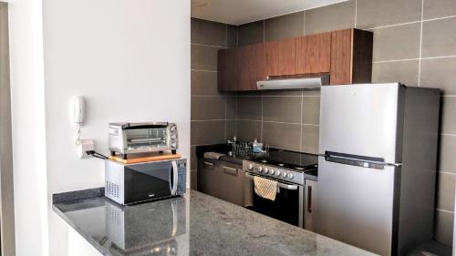 Una cocina o zona de cocina en Minimalistic and modern decore 1B apartment Polanco
