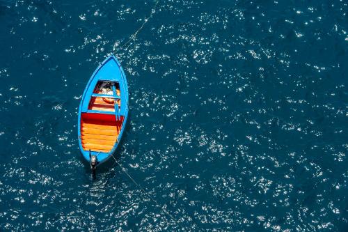 an overhead view of a boat in the water at Hotel Villa Maria Pia in Praiano