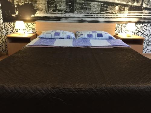 
Кровать или кровати в номере Апартаменты LUX в центре
