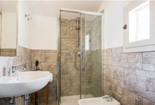 a bathroom with a sink and a shower at Agriturismo La Moraia in Poggibonsi