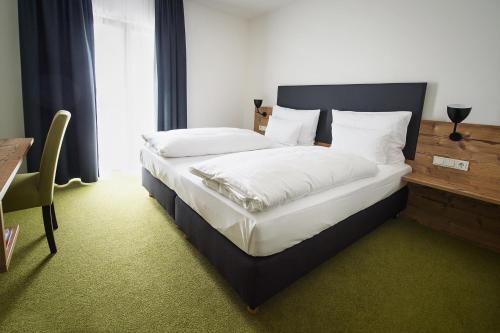Un ou plusieurs lits dans un hébergement de l'établissement Alb Inn - Hotel & Apartments