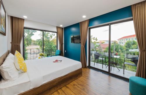 Giường trong phòng chung tại LENA HOMESTAY