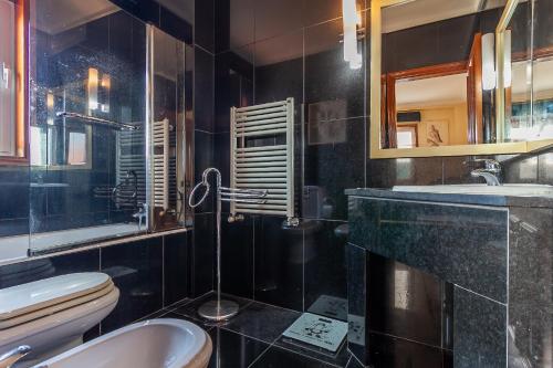Koupelna v ubytování Costa Nova Ria View Apartment by Home Sweet Home Aveiro