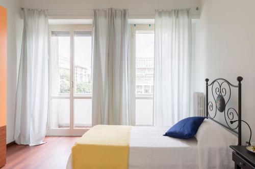 Katil atau katil-katil dalam bilik di DonBosco74 Apartment