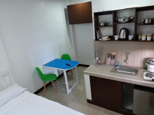 Kuchyň nebo kuchyňský kout v ubytování Clark-Pad Inn, Angeles City