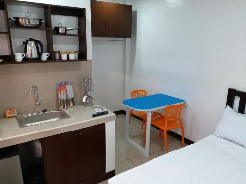 Kuchyň nebo kuchyňský kout v ubytování Clark-Pad Inn, Angeles City