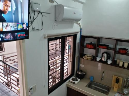Kuchyň nebo kuchyňský kout v ubytování Clark-Pad Inn, Angeles City