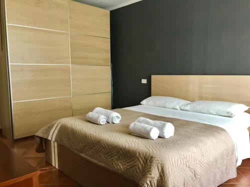 Ένα ή περισσότερα κρεβάτια σε δωμάτιο στο In Casetta