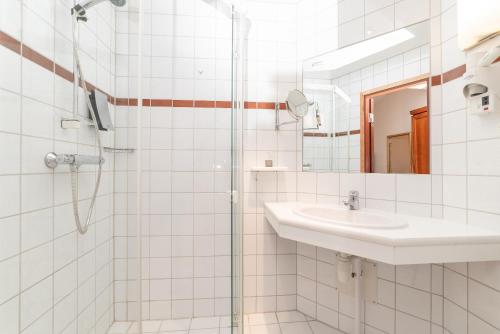 Ett badrum på Thon Hotel Sandnes