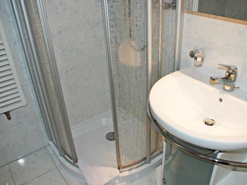 a bathroom with a sink and a shower at Apartment Casa Eduardo Apt-2 by Interhome in Ronco s/Ascona - Porto Ronco