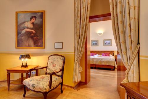 Ένα ή περισσότερα κρεβάτια σε δωμάτιο στο Schloss Lübbenau
