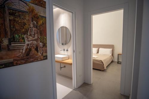 Postel nebo postele na pokoji v ubytování Mondello Felix - 3 appartamenti in villa a 600m dal mare