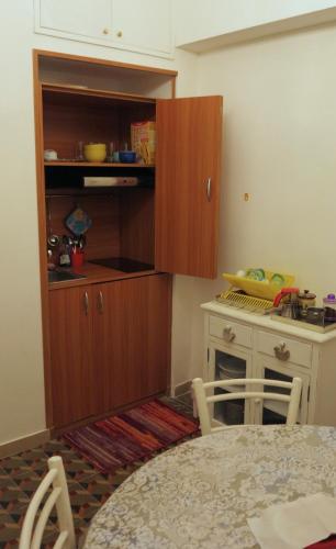 Kuchyň nebo kuchyňský kout v ubytování B&B Del Teatro