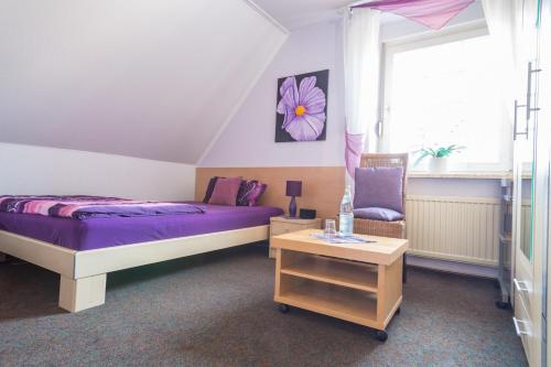 Postel nebo postele na pokoji v ubytování Pension Blumen-Villa