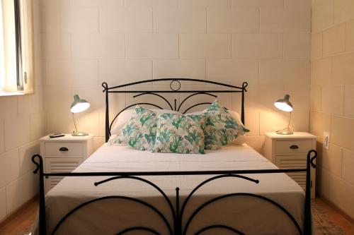 Ένα ή περισσότερα κρεβάτια σε δωμάτιο στο Charming Home in Republic street