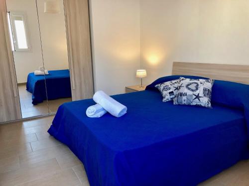 Postel nebo postele na pokoji v ubytování Casa Vacanze Aria Salentina