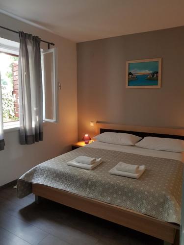 Postel nebo postele na pokoji v ubytování Guesthouse Jet