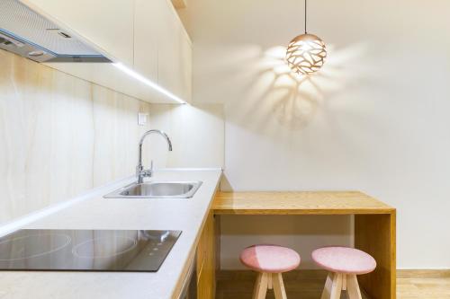 Kuchyň nebo kuchyňský kout v ubytování Iliomagic Luxury Suites Thassos