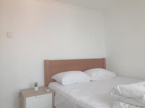 Ένα ή περισσότερα κρεβάτια σε δωμάτιο στο Alfama Guest House