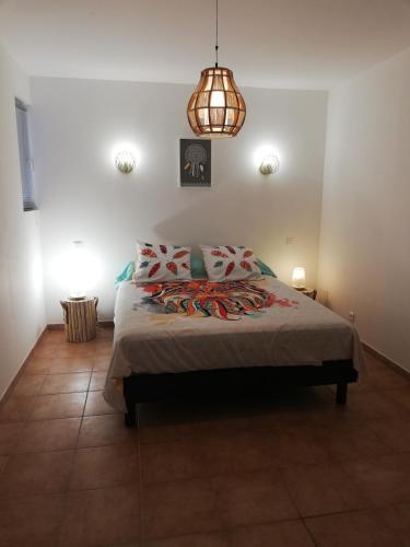 Au Sabluline chambres d'hôtes gîtesにあるベッド