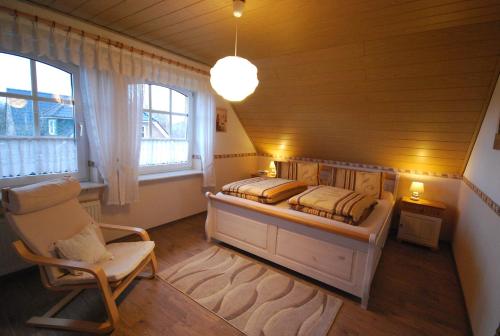 Cama o camas de una habitación en Ferienwohnung -Am Kanal-