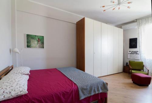 Katil atau katil-katil dalam bilik di Via Pai Home a due passi da Firenze
