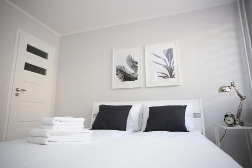 Posteľ alebo postele v izbe v ubytovaní APARTAMENT SŁOBÓDZKIEGO 7