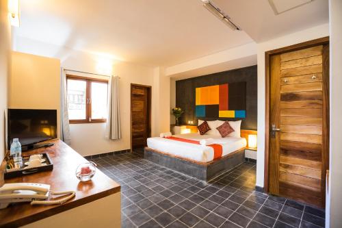 Postel nebo postele na pokoji v ubytování PATIO Hotel & Urban Resort