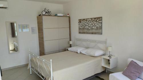 Posteľ alebo postele v izbe v ubytovaní Studio Apartment Luce