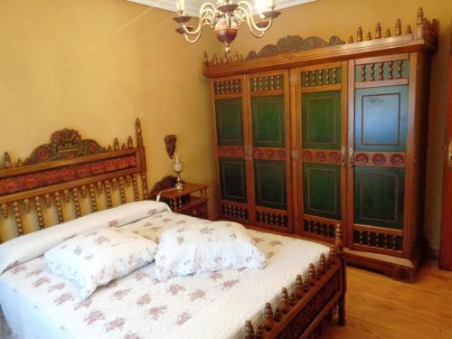 Ένα ή περισσότερα κρεβάτια σε δωμάτιο στο Apartamento Casa Geli # 2