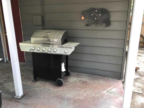 a grill sitting on a table next to a wall at 1625A Atroari Chalet in South Lake Tahoe