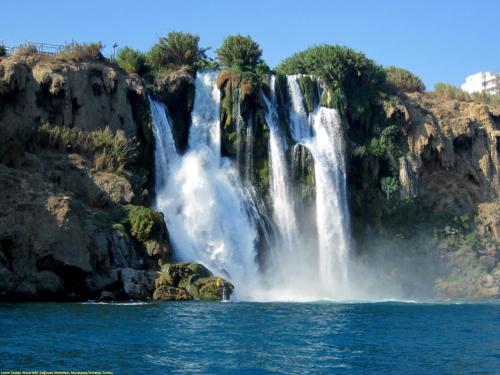 a waterfall in the middle of a body of water at Karden Otel in Antalya