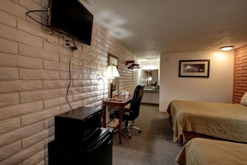 TV a/nebo společenská místnost v ubytování Country Inn Beaver Utah