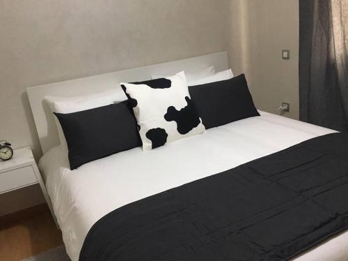 Ένα ή περισσότερα κρεβάτια σε δωμάτιο στο Appartement près de Novotel face au parc WELCOME STAY